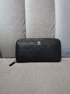CHANEL Black Quilted Zip-Around Leather Wallet with Silver CC